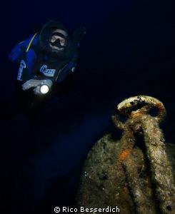 Rebreather Diver & wreckage by Rico Besserdich 